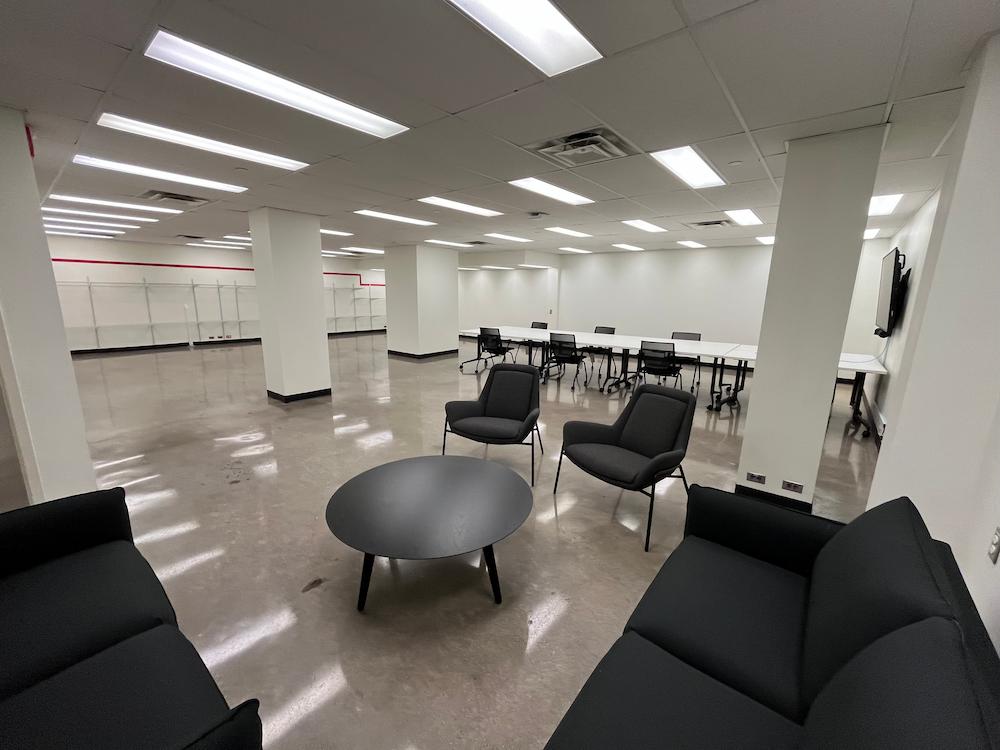 Work with Midwest Floor Restore for polished concrete image shows chairs and table on concrete floor