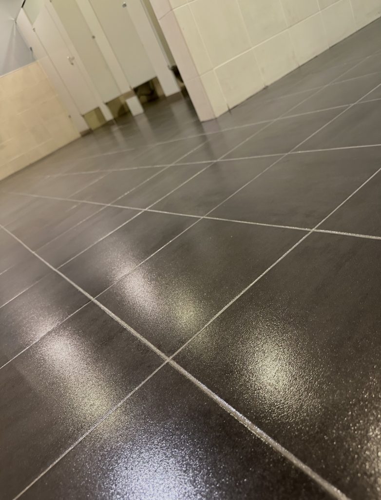 restored tile flooring in bathroom