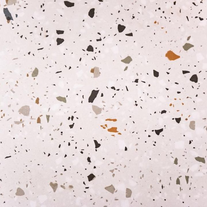 Get your Cincinnati Terrazzo Floor Restoration done right with Midwest Floor Restore image shows terrazzo flooring with spots of various colors