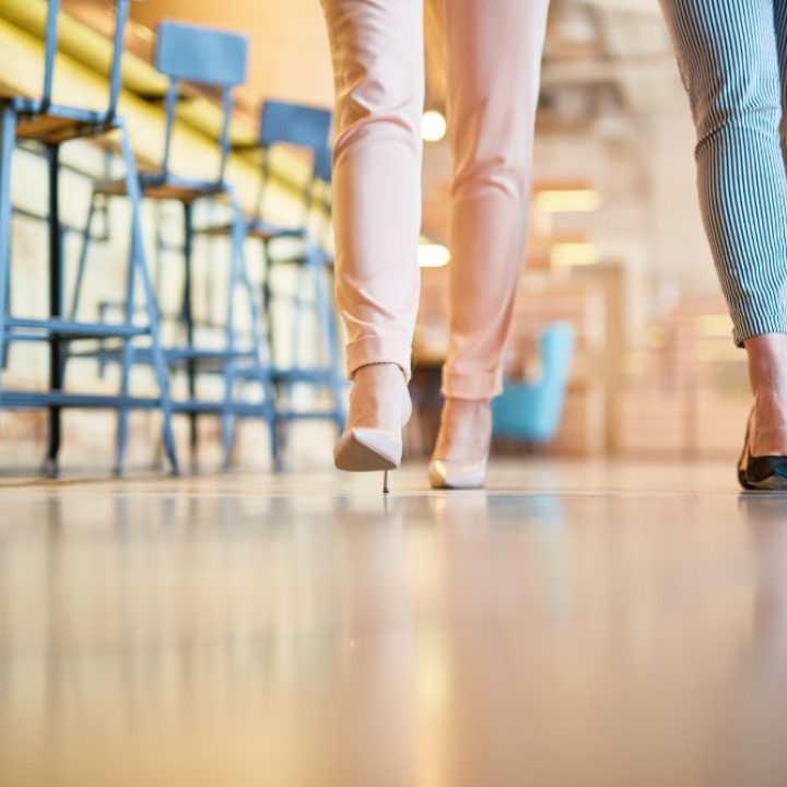 Contact Midwest Floor Restore for expert Cincinnati Commercial Floor Cleaning services image shows shoes on floor